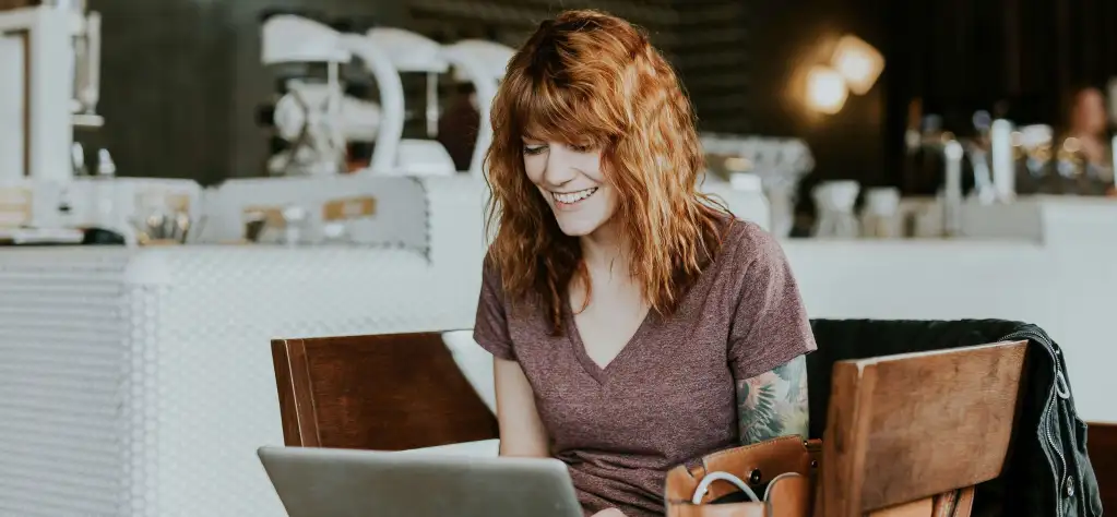 Person considering virtual mental health care via laptop